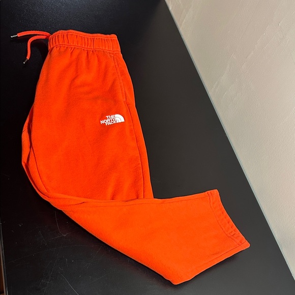 The North Face Kids Bright Orange Sweatpants - Picture 1 of 5
